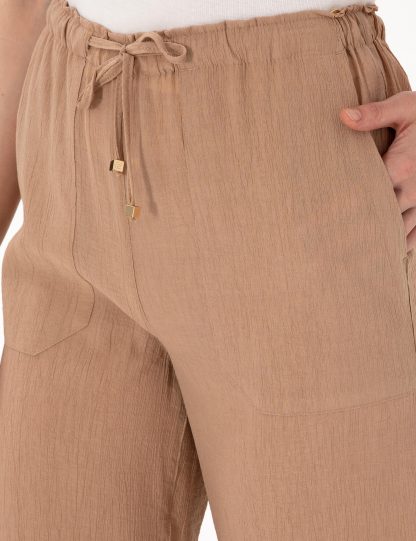 شلوار پارچه ای زنانه بژ پیرکاردین