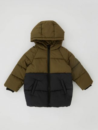 کاپشن نوزاد پسر خاکی دفکتو