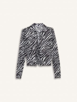 بلوز زنانه سفید دفکتو