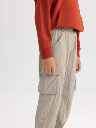 شلوار جاگر پسرانه بژ دفکتو تصویر ۱